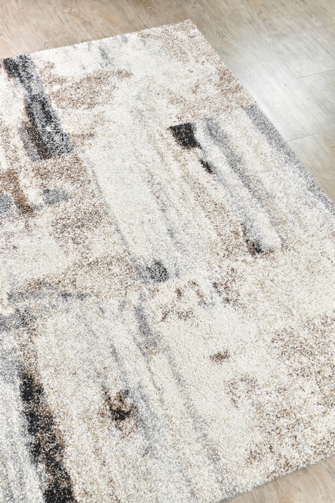 Modern shaggy rug with playful multicolour design