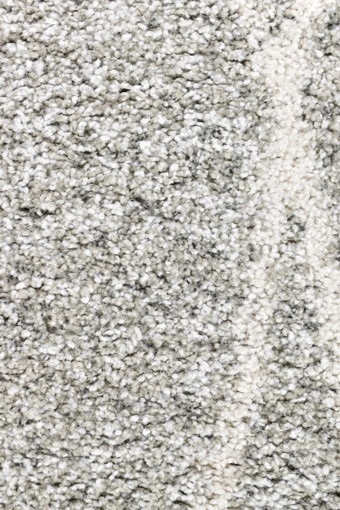 Close-up of the Alpha Shaggy Grey rug texture.