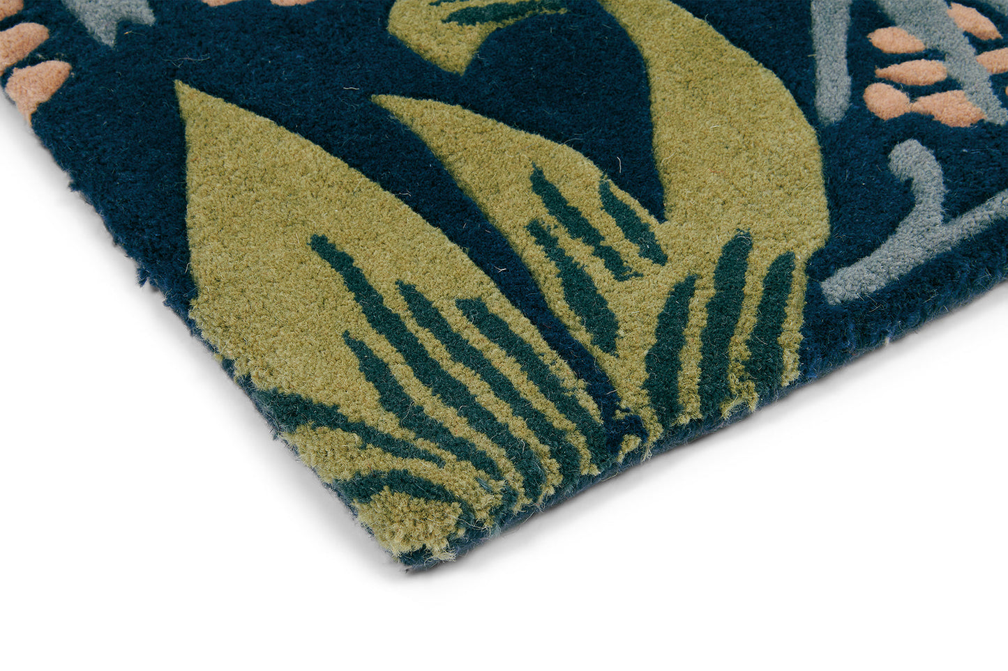 Strawberry Thief Indigo rug, highlighting its design and texture.