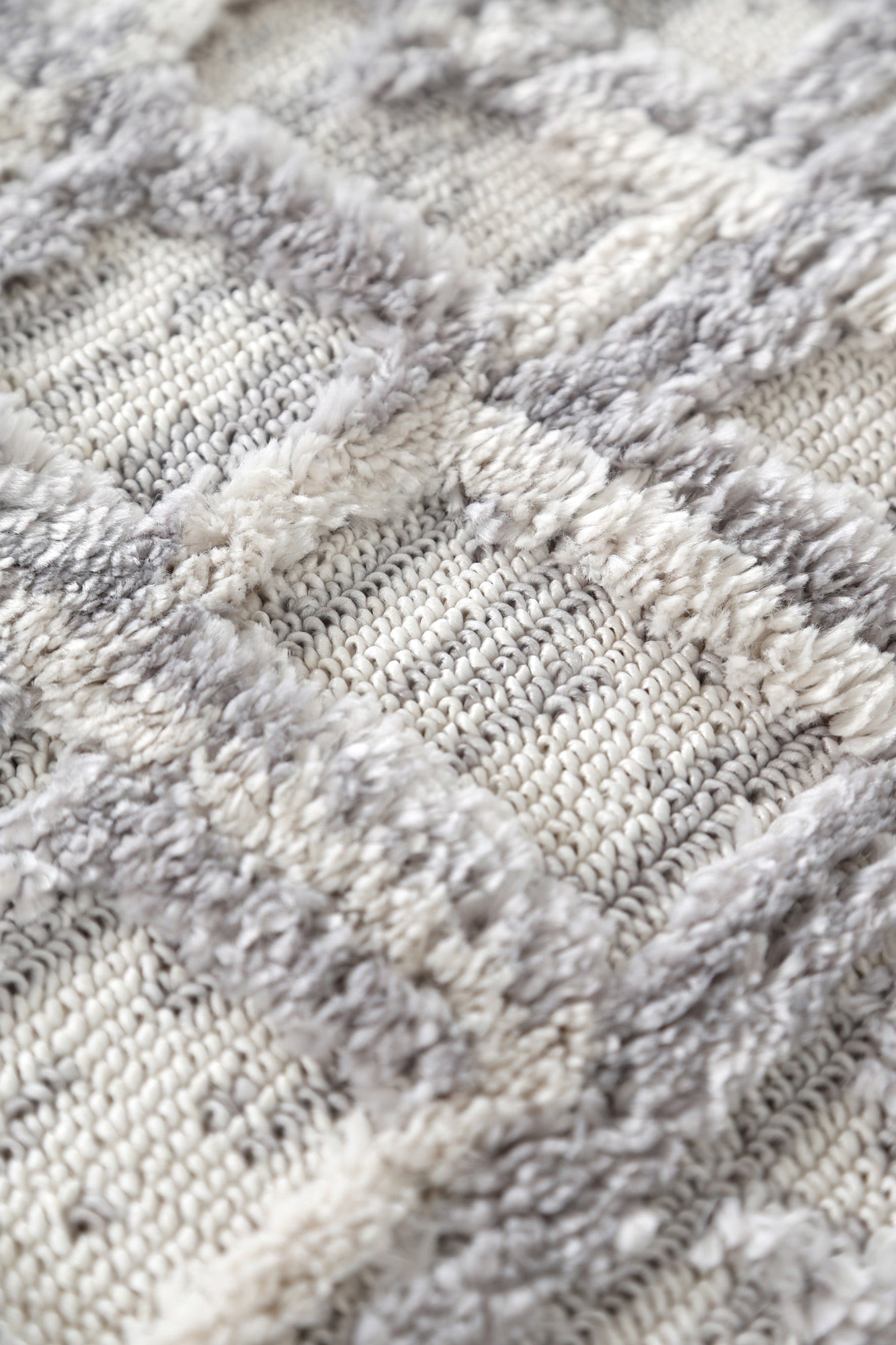 Warm lighting on Bilbao grey rug in styled room